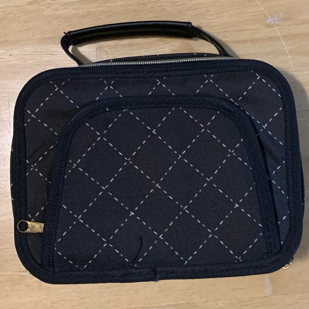 NintendoDS Carry Case with 12 game storage pockets.